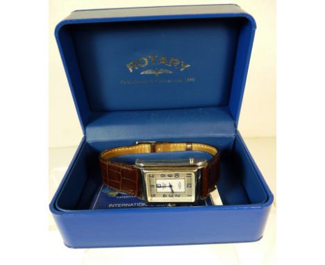 A Gents Swiss "Rotary Elite" self wind wristwatch in original box. The watch in steel reverso case and numbered 0244. The eng