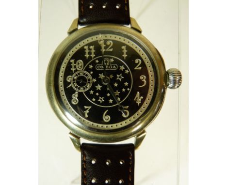 A gents "Omega" nickel cased manual wind wristwatch, the large black dial with central silvered star decoration, silvered ara