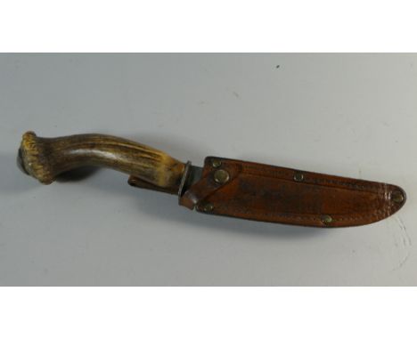 A Bone Handled Hunting Knife with Leather Scabbard, 26 cm Long