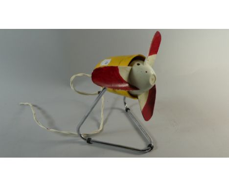 A Vintage Electric Desktop Fan in The Form of An Aircraft Engine 