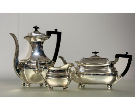 A George V silver three piece tea and coffee service, James Dixon &amp; Sons, Sheffield 1924, in the Regency taste, each piec