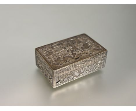 Wang Hing, a Chinese Export silver box, c. 1900, of plain oblong form, the hinged cover repousse with a battle scene, the sid