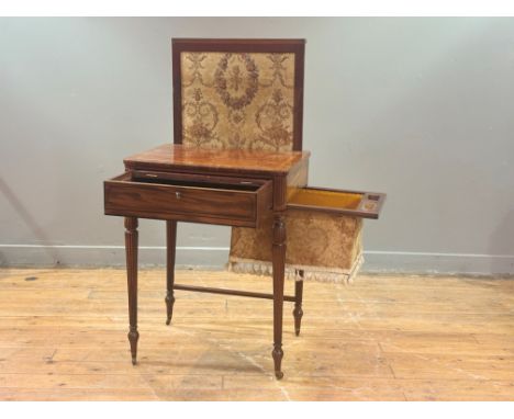 A William IV boxwood and ebony-inlaid mahogany writing and sewing table, the frieze drawer with slide-out writing slope compl