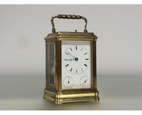 A French gilt-brass alarm repeater carriage clock, probably early 20th century, the five glass case with swing carry handle e