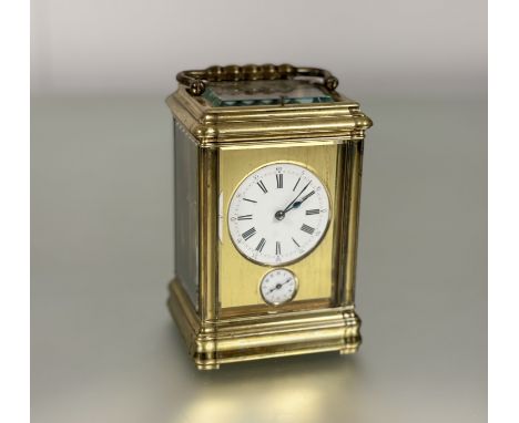 A French gilt-brass alarm repeater carriage clock, probably early 20th century, the five glass case with swing carry handle e