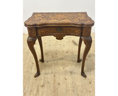 Property of a Lady of Title: a Dutch walnut and marquetry inlaid foldover card table, with concertina action, the shaped, lob