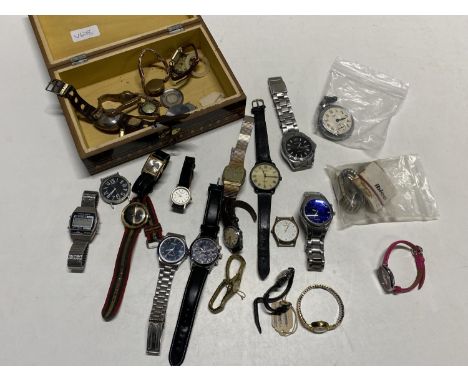 A vintage box with contents of assorted men's and ladies watches including Fossil, Timex, Sekonda etc (untested)