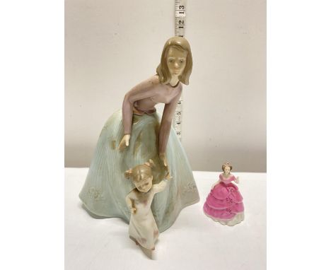 A large Nao figurine 1318 and a small Coalport figurine