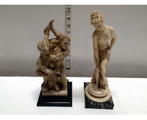 A vintage Hercules and Diomedes resin sculpture and resin Venus figurine. Tallest 26cm