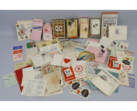 Playing card ephemera, large quantity of bridge and whist score cards, 1920's to 1950's, including unused packs and pads, art