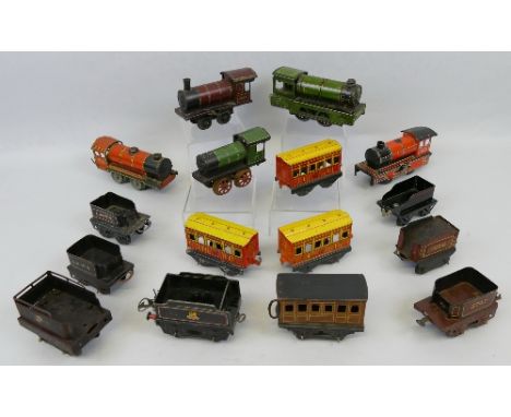 '00' gauge, five tin-plate clockwork 0-4-0 locomotives, seven tenders by Hornby, Brimtoy etc and four Brimtoy passenger coach
