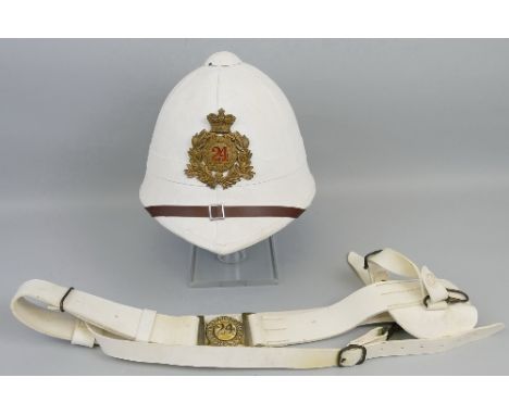 A military white helmet, with helmet plate for the 24th Regiment of foot together with a white belt and cross strap (2)