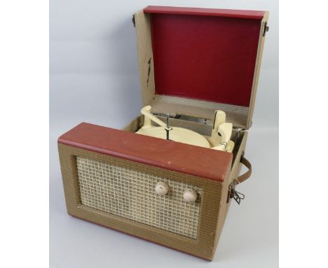 Monarch record player, with three-speed record change in red and brown check case, 38cm wide