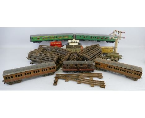 Hornby '0' gauge, Metropolitan locomotive and two passenger coaches, six various wagons, a quantity of three-rail track and a