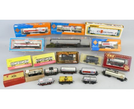 Various makers '00' gauge, nineteen predominantly Esso tank wagons by Bachmann, Mainline, RoCo, GMR, Trix Twin, Schicht etc, 
