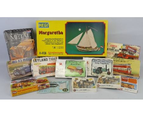 Model construction kits, twelve boxed kits by Air-fix, Hegi, Hales, Davric etc including buses and trams, sailing boat, vinta