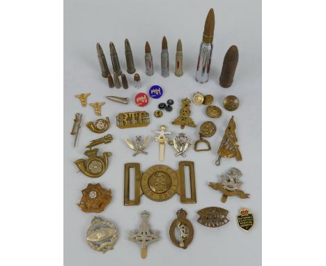 ***AMENDED DESCRIPTION***
Quantity of military badges, including Commando Fairburn knife, 50/52 Commando Middle Eastern Badge