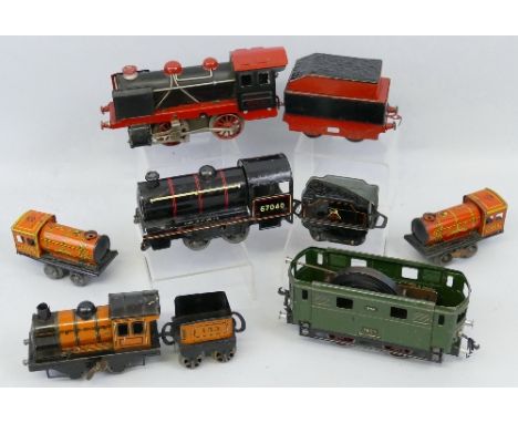'0' gauge, "Rico" tin-plate clockwork 0-4-0 locomotive and tender No.1000, a Bucherer tin-plate clockwork 0-4-0 Buco No.212 p