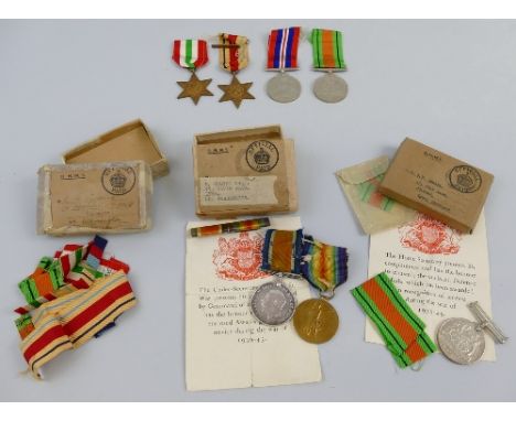 A pair of WWI medals, comprising War Medal and Victory Medal awarded to 188723 Gnr W. H. Cuming R.A., five WWII medals compri