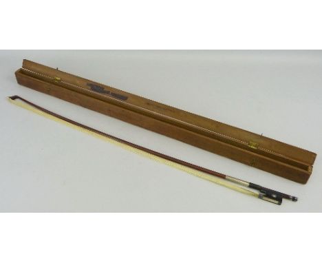 An Albert Nurnberger bow, with ebony and silver mounts and octagonal stick, impressed mark 74.5cm long, in wooden carrying ca