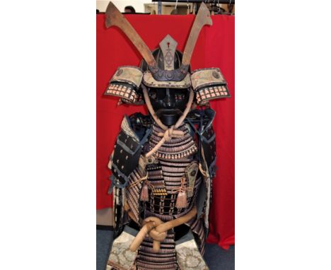 1950’s hand-made Japanese Samurai Suit of Armour. Consists of hat, face mask, hand threaded side and lower skirt armour. Some