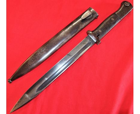 WW2 German K98 service bayonet, with matching numbered scabbard 1936 dated by Paul Weyersburg. Wooden grips, Good steel pomme