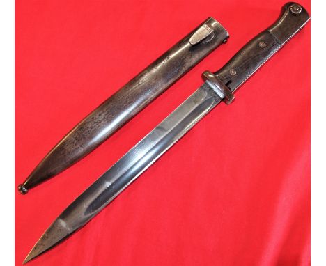 WW2 German K98 service bayonet, with matching numbered scabbard 1936 dated by Paul Weyersburg. Wooden grips, Good steel pomme