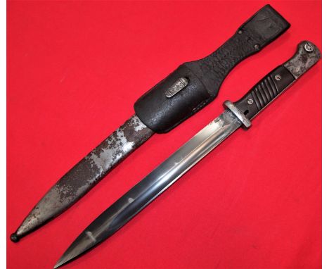 WW2 German K98 service bayonet, with matching numbered scabbard &amp; leather frog by Clemen &amp; Jung. Bakelite grips, very