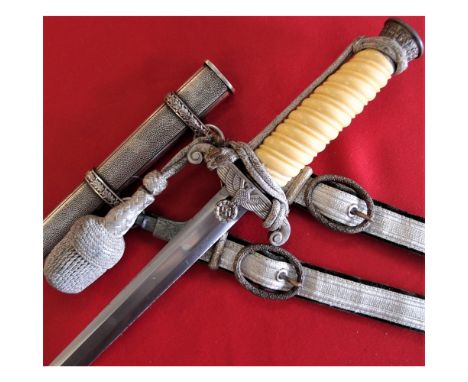 Features good condition white frosted zinc fittings, with white grip and eagle cross guard. Bullion portepee knot is tied to 