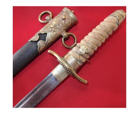 Good gilt finish remains to much of the elaborate brass fittings, along the partial wire wrapped ray skin grip, showing wear 