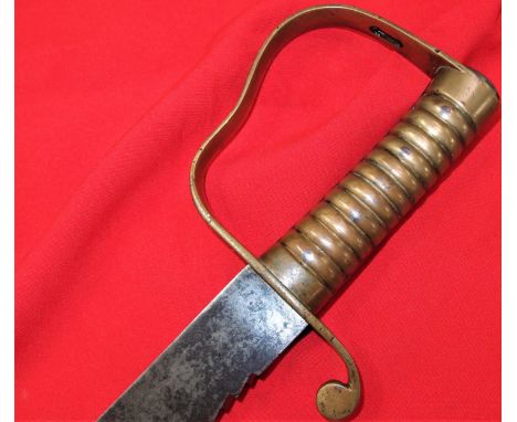 1856 Pattern British Army Pioneers ‘sawback’ short sword. It has a broad 57cm long blade with deeply cut sawback teeth sectio