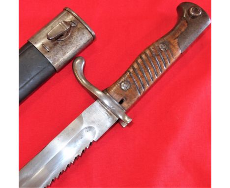 WW1 German 98/05 S ‘sawback’ Pattern Bayonet, with Scabbard by V. C. Schilling dated 1911. Metal birds head pommel, with work