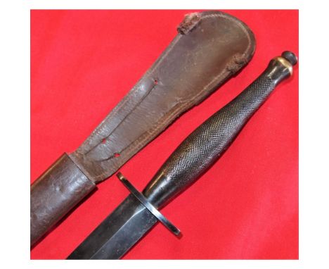 Urn shaped brass pommel with 2nd pattern type ‘hatched’ grip showing service use and blackened finish. ‘B’ (Wilkinson wartime