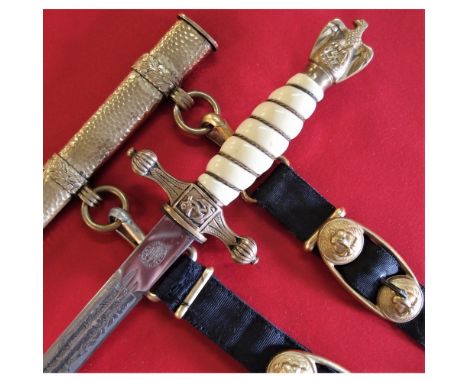 Pre-war made piece, with gilded brass fittings, with twisted wire white grip and eagle pommel. Fouled anchor guard, retaining