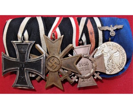 WW1/WW2 German medal bar group of 4. Includes 1914 Iron Cross 2nd Class, WW2 War Merit Cross with Swords, WW1 War Honour Cros