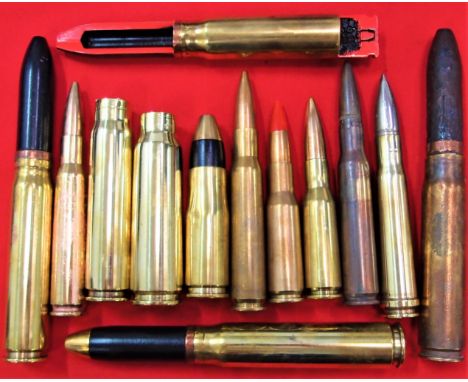 Mixed lot of inert brass ammunition of various calibres (13). Includes cut out type, most with projectiles etc. Polished and 