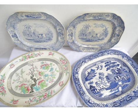 FOUR POTTERY MEAT PLATES
including Mintons Indian Tree pattern, blue and white Willow pattern and two Triumphal car pattern 