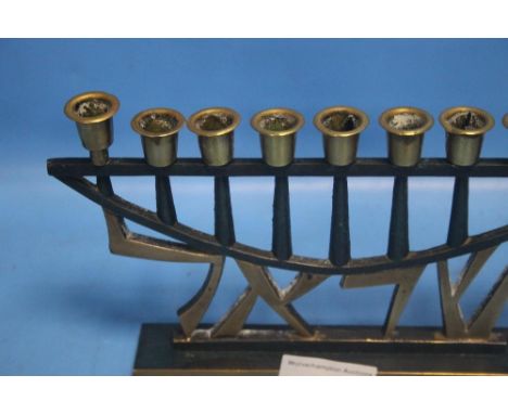 A JUDICA- PAL-BEL CO BRASS 9 LIGHT CANDLEABRA WITH HEBREW LETTER DECORATION