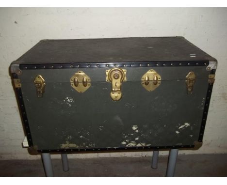A LARGE TRAVEL TRUNK