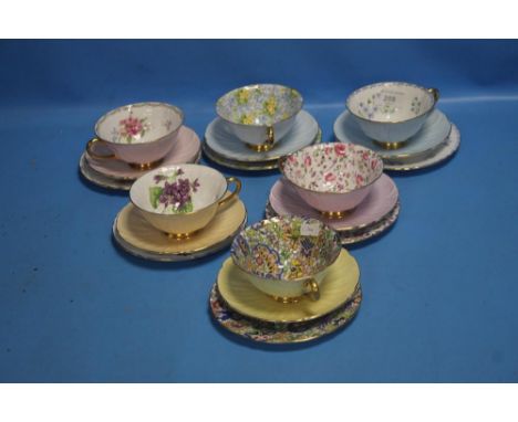 A COLLECTION OF SHELLEY CUPS AND SAUCERS 
