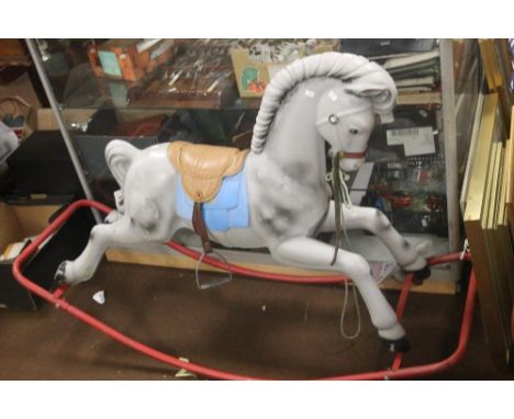 A VINTAGE CHILDS ROCKING HORSE