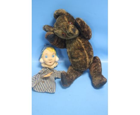 A VINTAGE JOINTED TEDDY BEAR AND A FINGER PUPPET 