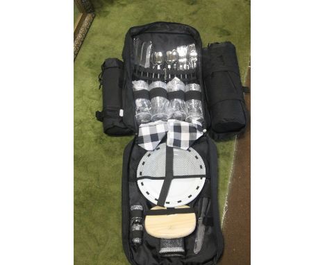 AN UNUSUAL PICNIC HAMPER CONTAINED IN A RUCKSACK