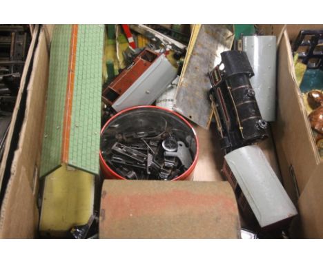 TWO TRAYS OF MODEL RAILWAY TO INCLUDE TIN PLATE ENGINE, CARRIAGES, STATION AND TRACK 