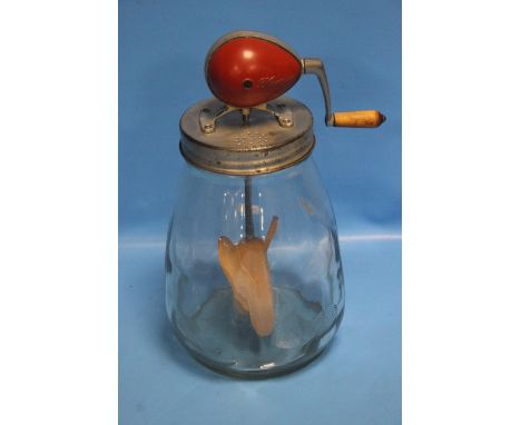 A VINTAGE BUTTER CHURN