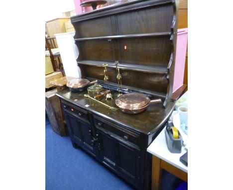 A DARK ERCOL DRESSER, with two drawers
