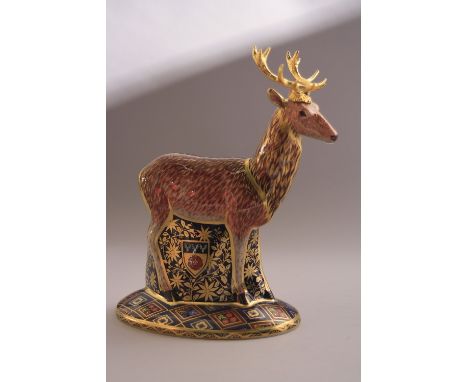 A BOXED LIMITED EDITION ROYAL CROWN DERBY PAPERWEIGHT, 'Hearldic Derbyshire Stag' No.172/950, the second in a pair of paperwe