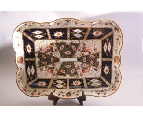 AN IMARI DESIGN CERAMIC TRAY, length approximately 44.5cm (restorations)