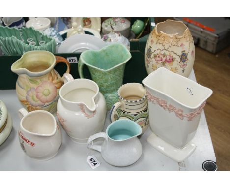 EIGHT VARIOUS JUGS AND VASES, to include Fieldings Crown Devon, Poole, Wedgwood, Wade etc
