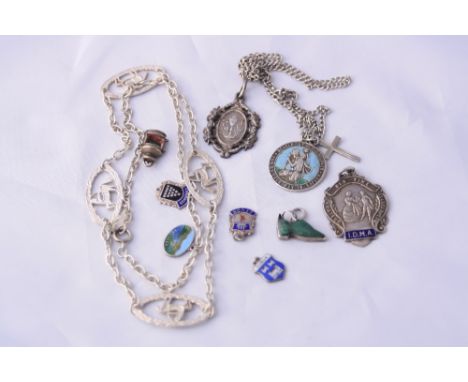 A SMALL COLLECTION  OF JEWELLERY, to include two white metal necklaces, together with two fobs and enamel pendants
